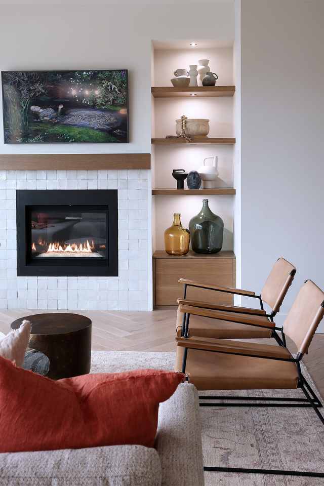 accent lighting in bookshelf of designer modern living room
